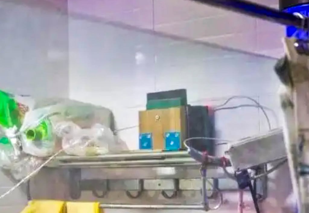 The wired-up loudspeaker, centre, was positioned right next to the dividing wall between the two homes. Photo: baijiahao.baidu.com