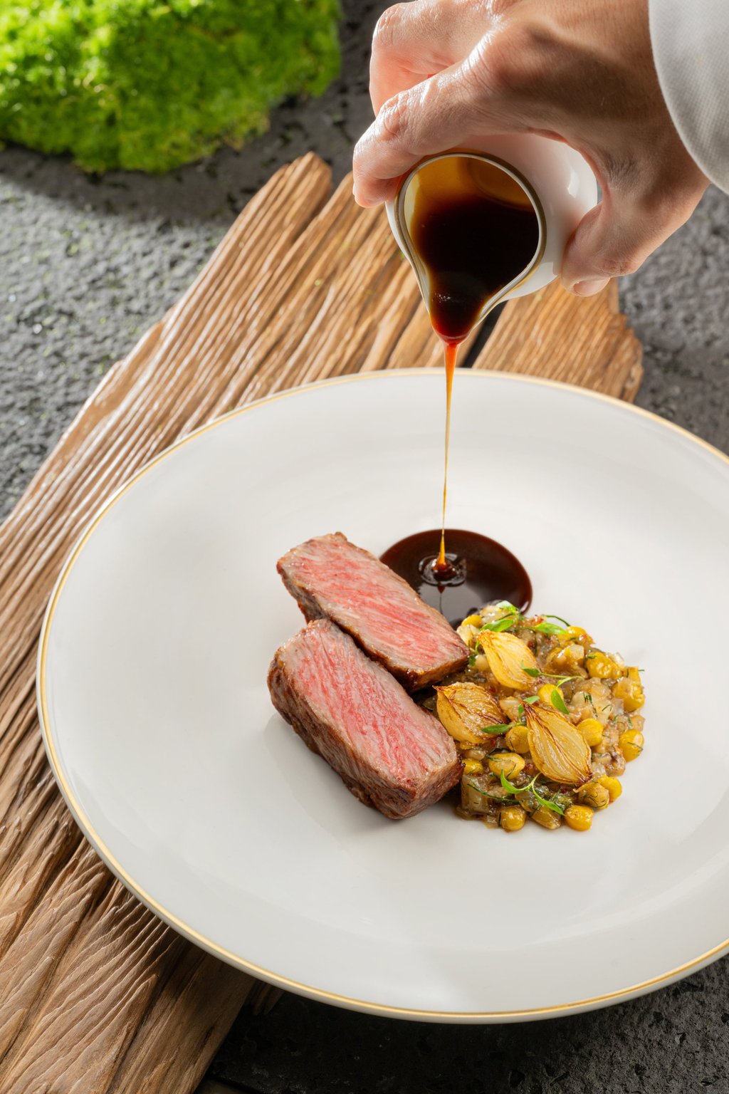 Wagyu sirloin, veal feet, chickpea stew, pepper sauce and pearl onions at Mesa by José Avillez. Photo: Handout Wagyu sirloin, veal feet, chickpea stew, pepper sauce and pearl onions at Mesa by José Avillez. Photo: Handout