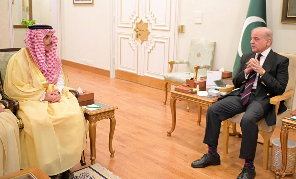 Saudi Arabia’s Foreign Minister Prince Faisal bin Farhan Al-Saud (left) and Pakistan’s Prime Minister Muhammad Shehbaz Sharif meet at the Prime Minister’s House in Islamabad on Sunday. Photo: Pakistan’s Ministry of Foreign Affairs/ Reuters