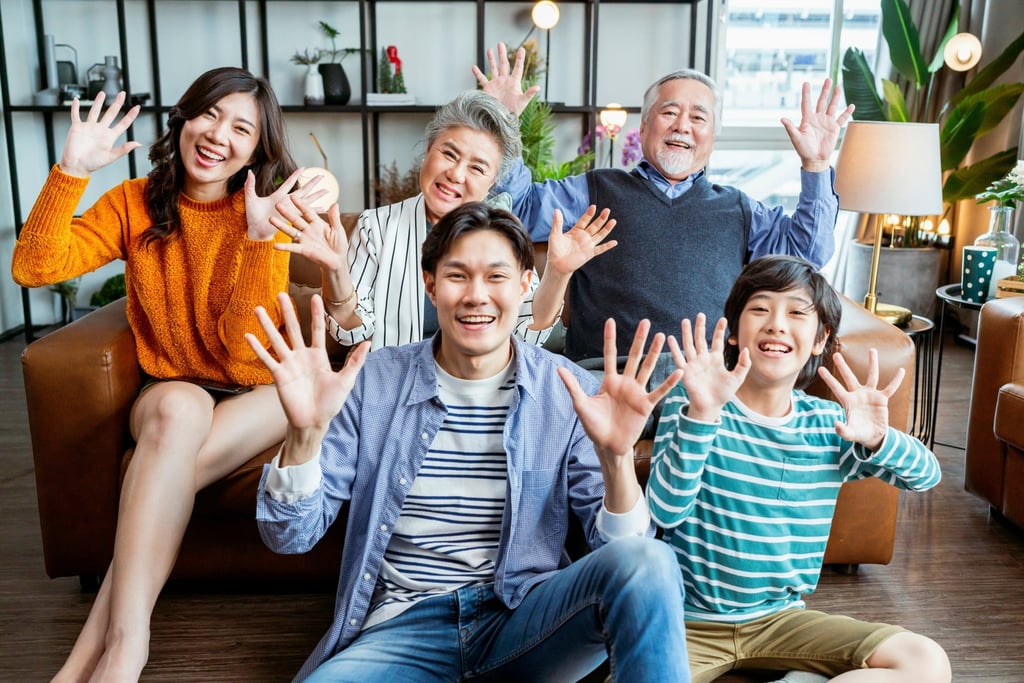 Getting together: Three generations of one family pose for a happy photograph. Photo: Shutterstock