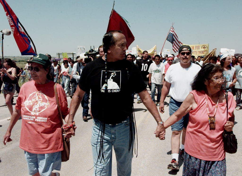Tatanka Means’ father, American Indian Movement activist Russell Means, marching in Whiteclay, Nebraska, in 1999. Photo: AP Tatanka Means’ father, American Indian Movement activist Russell Means, marching in Whiteclay, Nebraska, in 1999. Photo: AP