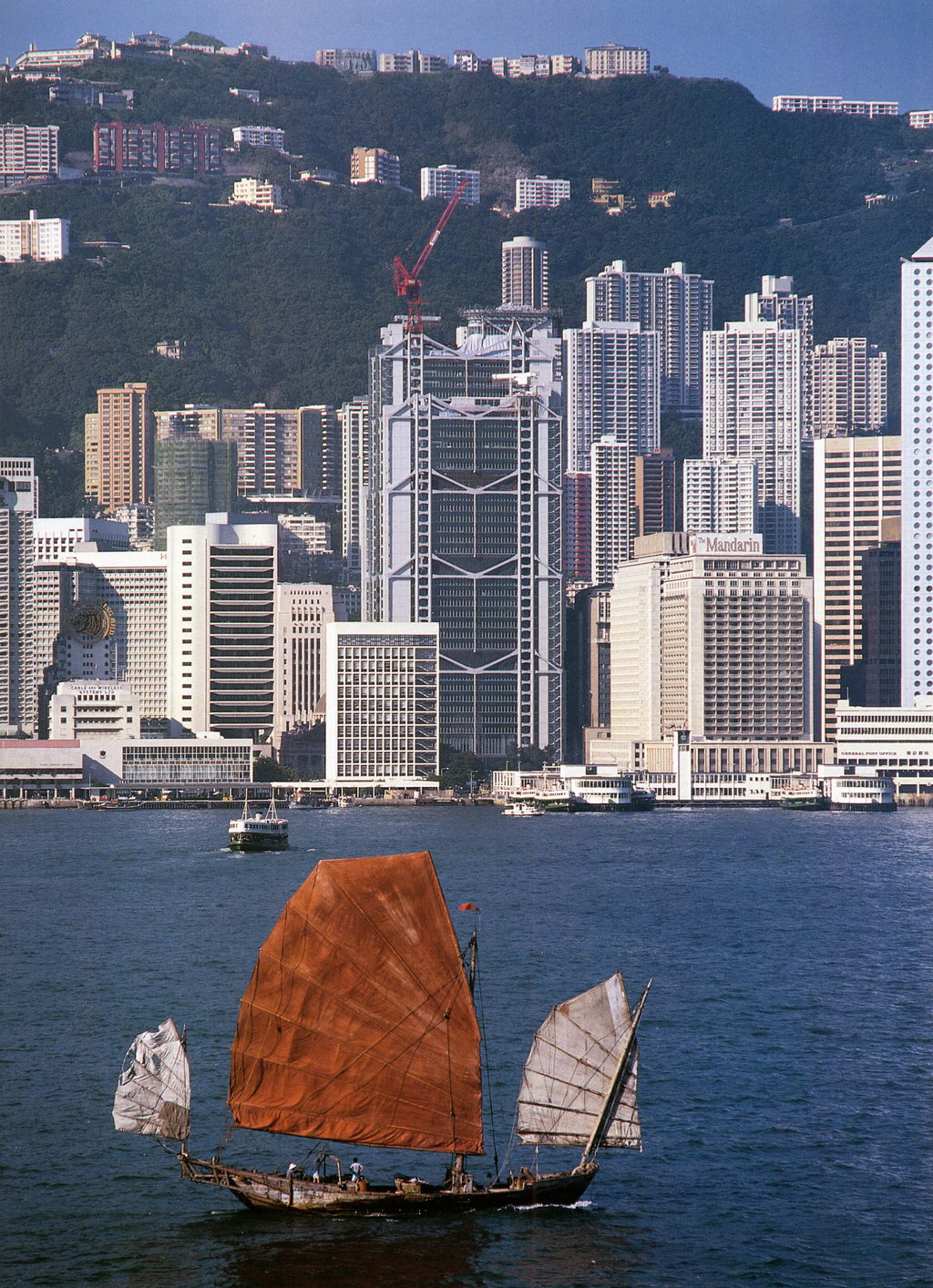The Hong Kong and Shanghai Bank and Junk (1985). This celebrated perspective from across Victoria Harbour is now showing as part of the Design Trust’s exhibition “The Art of Movement”, which traces Hong Kong’s architectural art and natural landscapes from the 1980s to the present day. St John’s Building, 33 Garden Road, Central, until April 12. Photo: courtesy Ian Lambot and Blue Lotus Gallery The Hong Kong and Shanghai Bank and Junk (1985). This celebrated perspective from across Victoria Harbour is now showing as part of the Design Trust’s exhibition “The Art of Movement”, which traces Hong Kong’s architectural art and natural landscapes from the 1980s to the present day. St John’s Building, 33 Garden Road, Central, until April 12. Photo: courtesy Ian Lambot and Blue Lotus Gallery