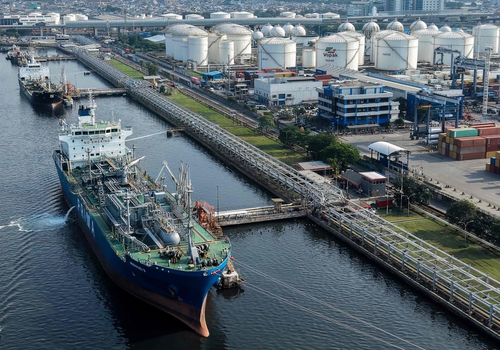 Tankers and cargo ships dock at the oil depot and container terminal of Tanjung Priok Port in Jakarta on Tuesday. Photo: AFP