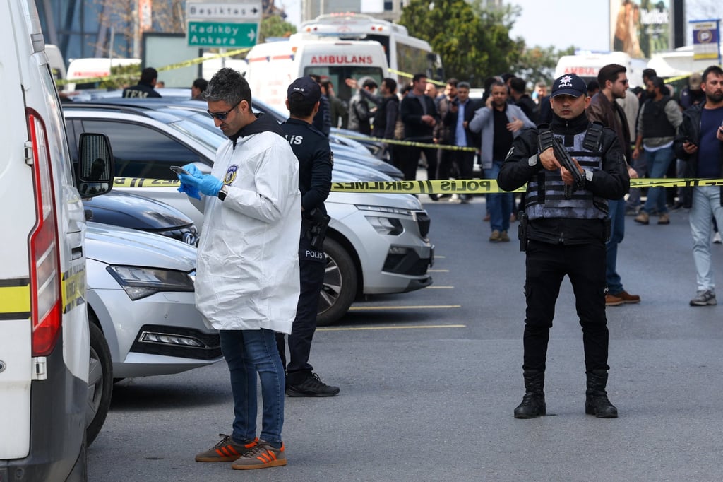 A forensic expert arrives at the scene after gunfire was heard near the building housing the Israeli consulate in Istanbul, Turkey. Photo: Reuters