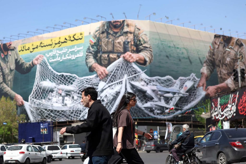 A billboard in Tehran reads: ‘The Strait of Hormuz remains closed’. Photo: AFP A billboard in Tehran reads: ‘The Strait of Hormuz remains closed’. Photo: AFP