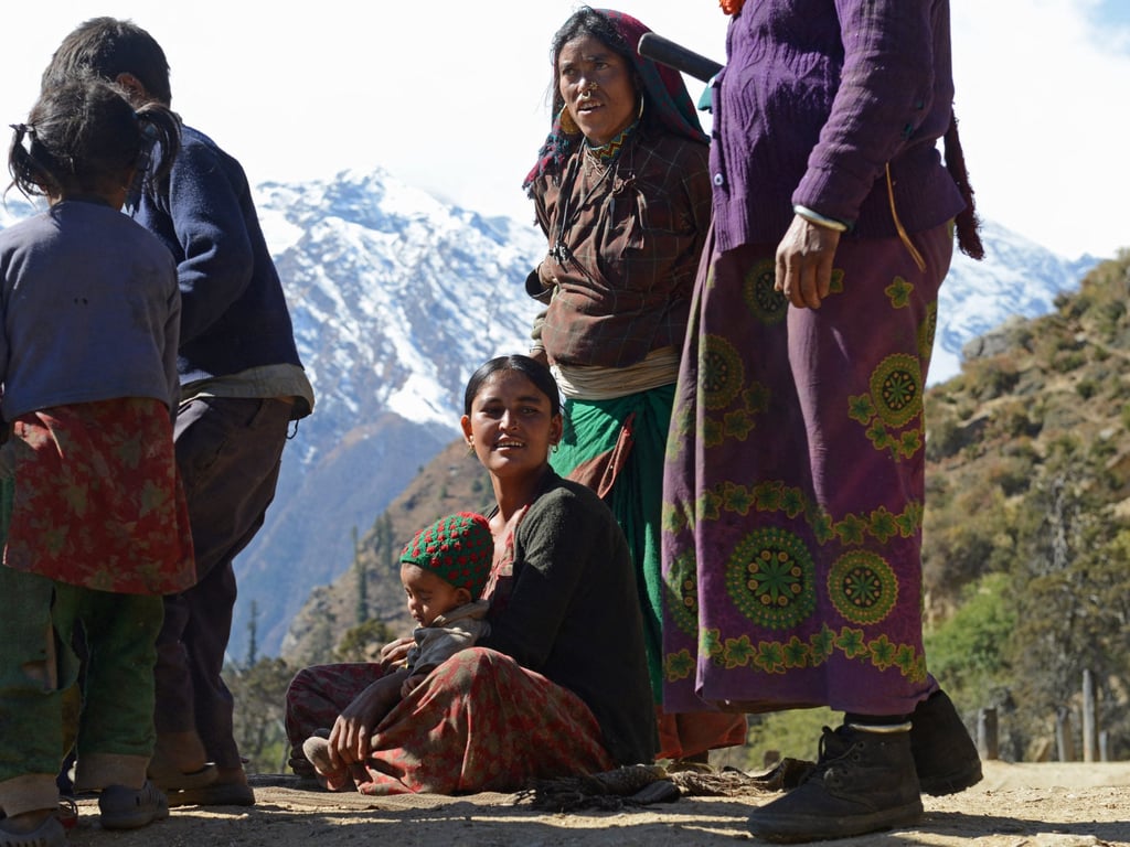 A Dalit woman sits with a child in Humla district, in Nepal’s remote northwest. Photo: AFP