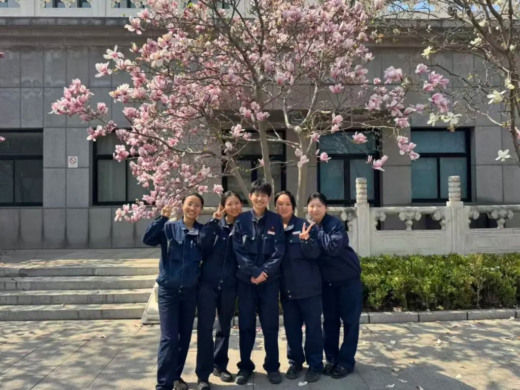 Famous Five: The Fire Roses, above, have to work in extremely hot conditions. Photo: QQ.com