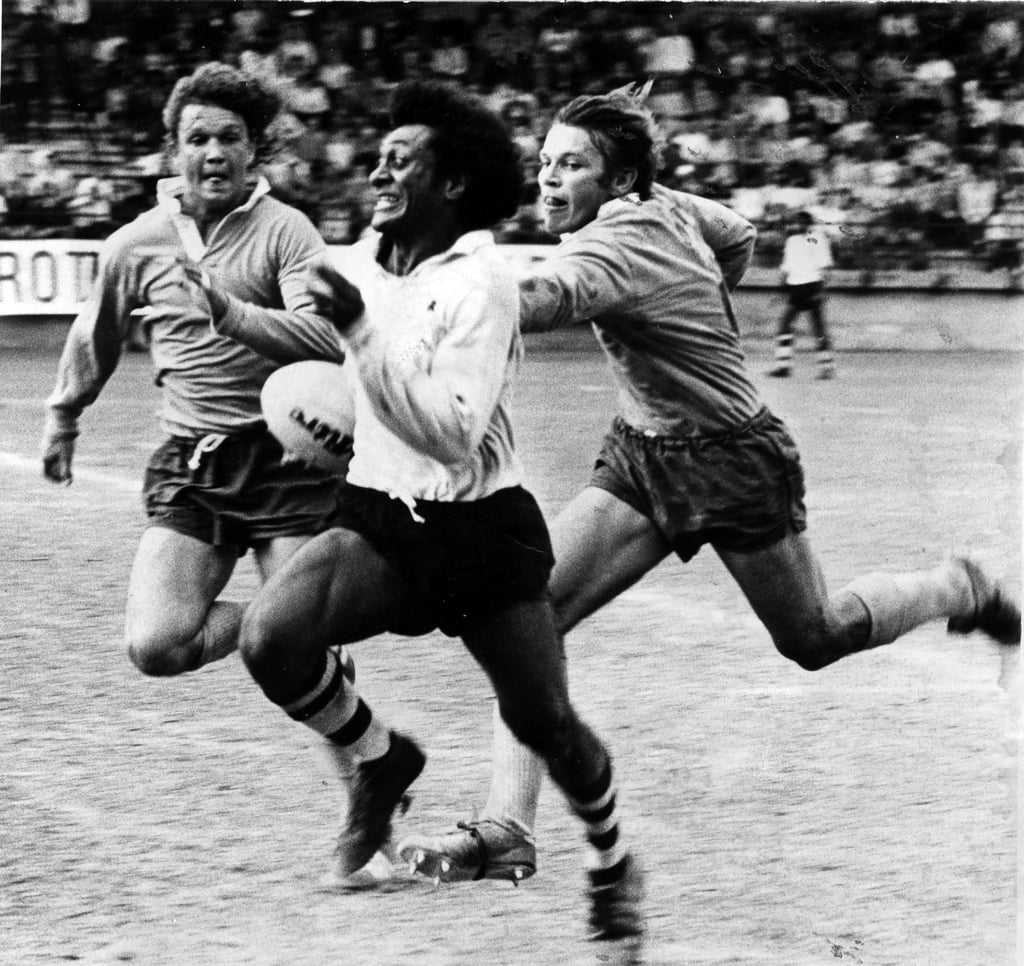 Seremaia Tui Cavuilati shows the dash that made Fiji such a hit at the Rothmans-Cathay Pacific Seven-a-Side Championship, as it was known in 1976, at the Hong Kong Football Club. Cavuilati is pursued by Gary Thomas (left) and Stephen Streeter in the semi-final against the Wallaroos. However, the Australian team would progress to the final, where they lost to the winners of the inaugural Hong Kong Sevens, New Zealand’s Cantabrians. Photo: SCMP Archives