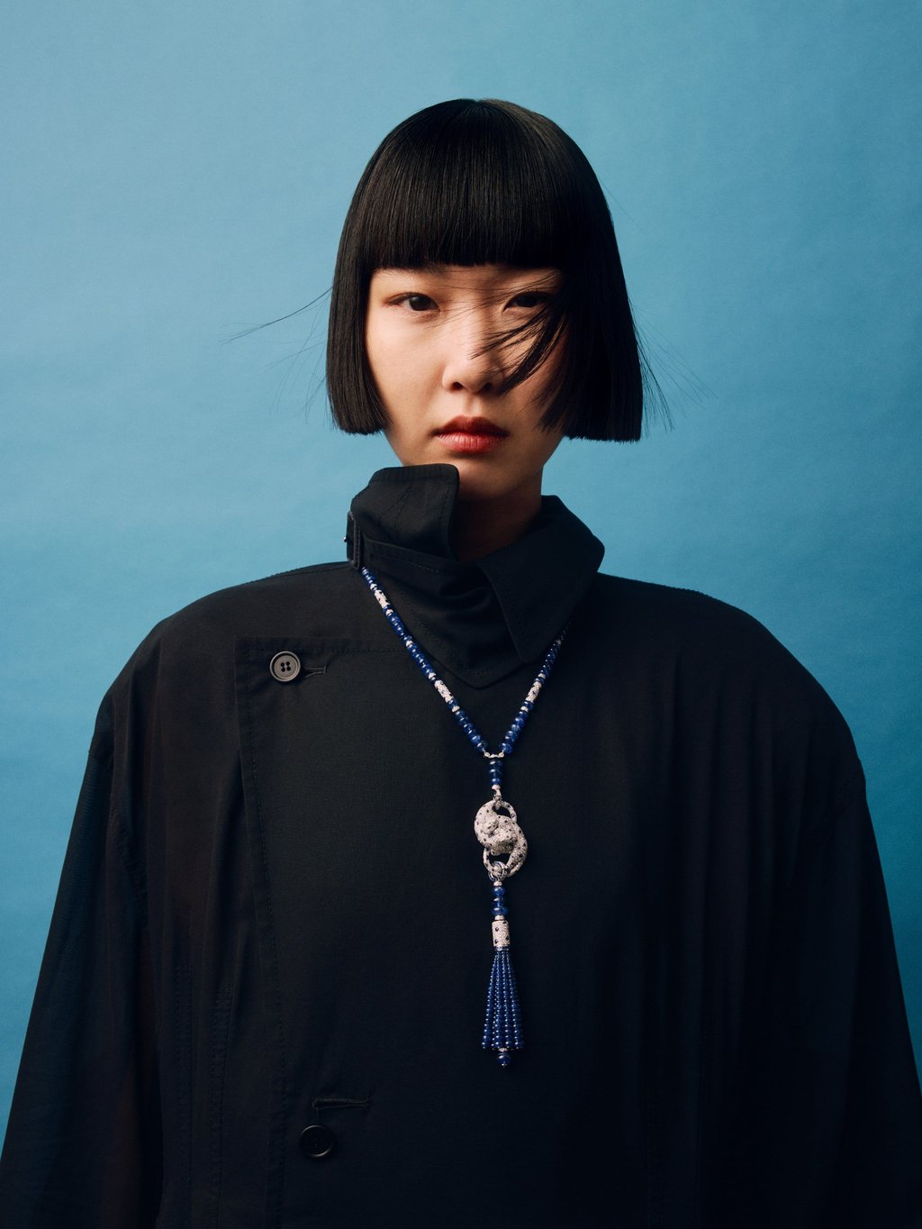 Necklace: Cartier. Coat: Carven