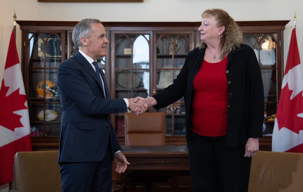 Prime Minister Mark Carney shakes hands with MP Marilyn Gladu in Ottawa on Wednesday. Photo: The Canadian Press via AP