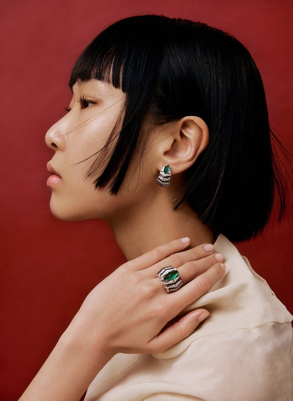Earring, ring: Cartier. Shirt: Sportmax