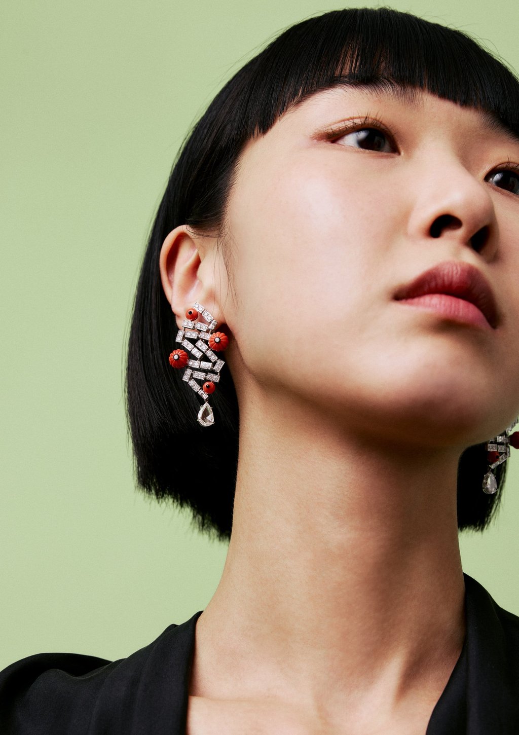Earrings: Cartier. Dress: Maison Margiela