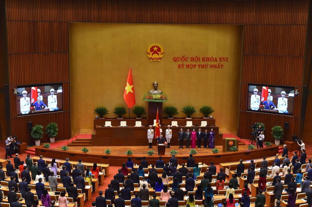 Le Minh Hung’s oath-taking ceremony during the National Assembly session in Hanoi on Tuesday. Hung previously served as central bank governor from 2016 to late 2020. Photo: AFP