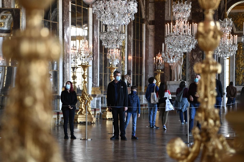 People visit the Palace of ⁠Versailles in France. Photo: AFP
