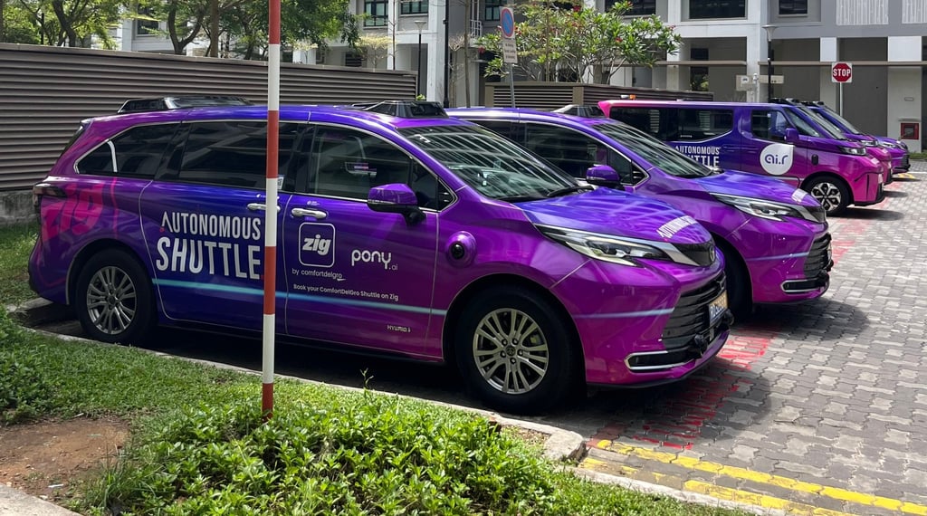 A fleet of robotaxis is seen parked outside a building in Punggol, Singapore. Photo: Jean Iau