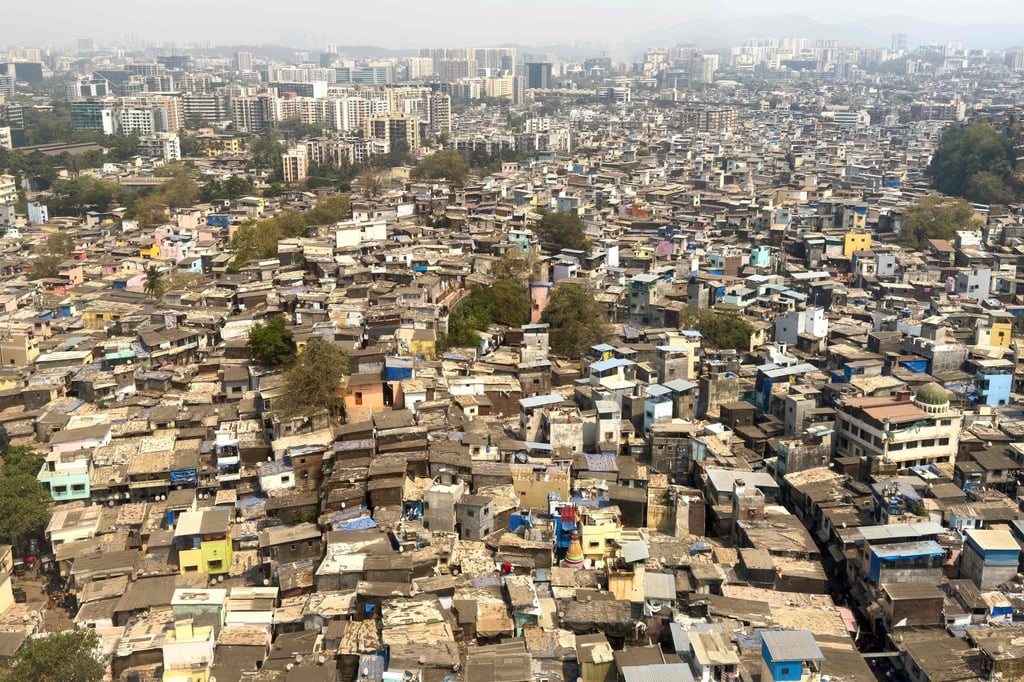 Slums and residential buildings are seen in Mumbai, India, last month. Much of Asia’s existing housing stock fails to meet basic liveability standards. Photo: AFP Slums and residential buildings are seen in Mumbai, India, last month. Much of Asia’s existing housing stock fails to meet basic liveability standards. Photo: AFP
