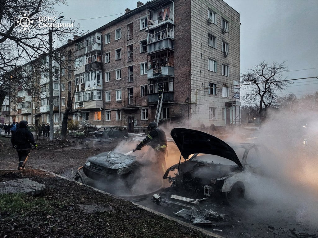 A firefighter works at the site of a Russian drone strike near the town of Konotop in Ukraine on Friday. Photo: Press service of the State Emergency Service of Ukraine in Sumy region via Reuters