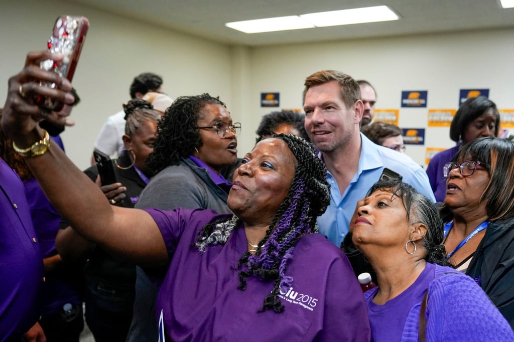 Eric Swalwell poses for a photo after holding a town hall meeting in Sacramento last week. Photo: AP