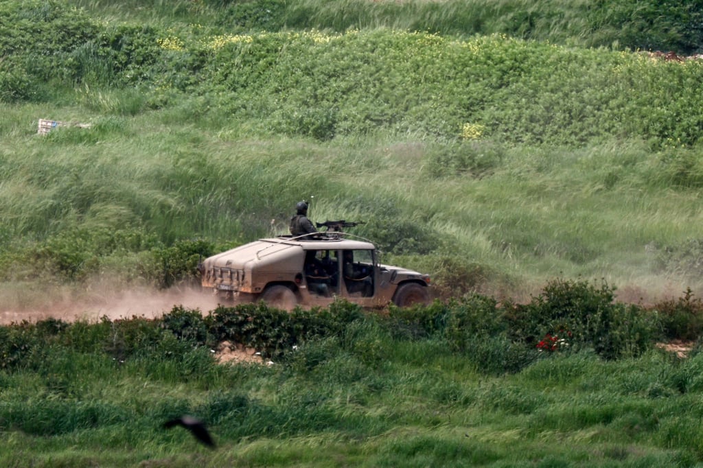 An Israeli military vehicle in Lebanon, as seen from the Israeli side of the border. Photo: Reuters An Israeli military vehicle in Lebanon, as seen from the Israeli side of the border. Photo: Reuters
