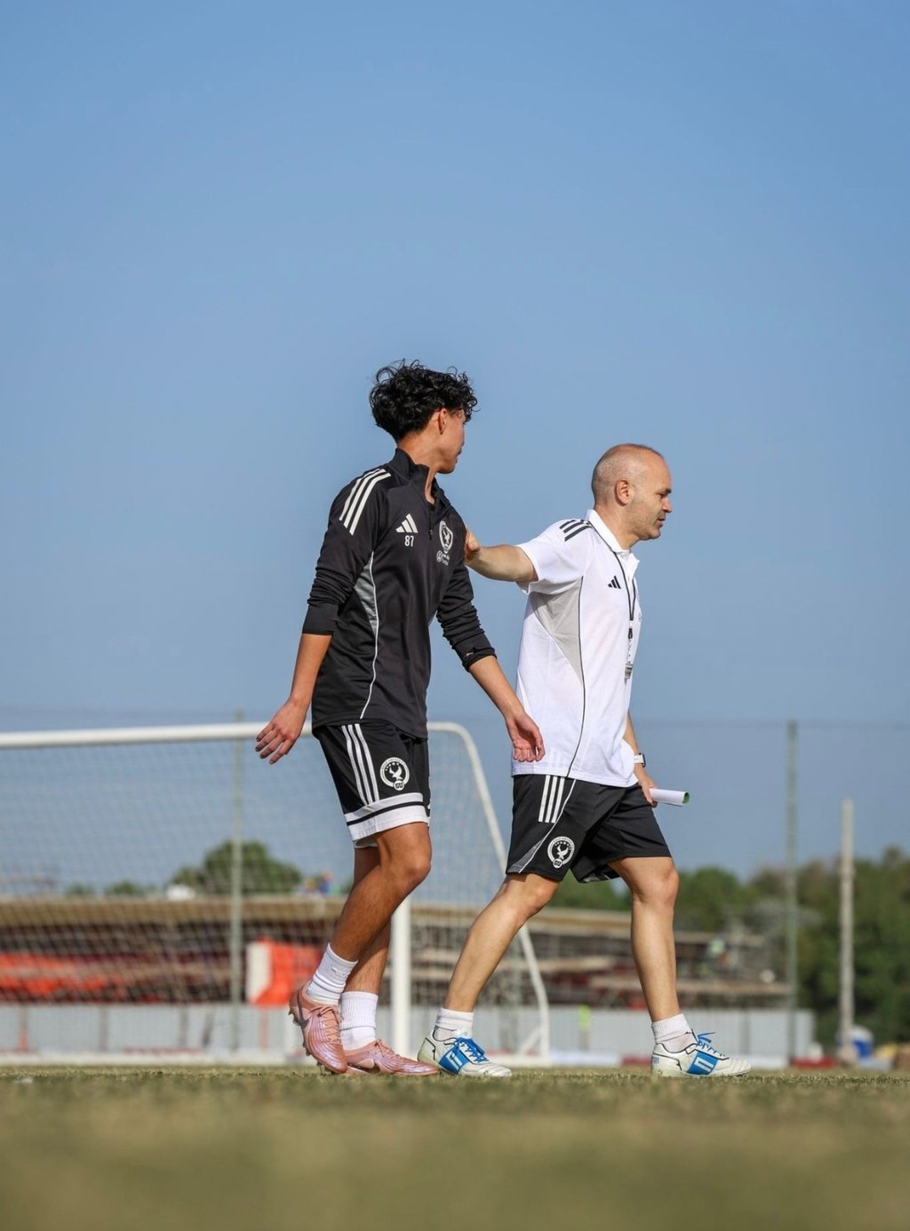 Ryan Fok (left) with Barcelona legend Andres Iniesta. Photo: Gulf United FC Ryan Fok (left) with Barcelona legend Andres Iniesta. Photo: Gulf United FC