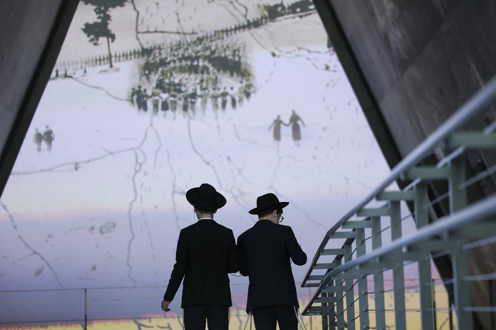 Visitors look at an exhibition ahead of Israel’s national Holocaust memorial day at Yad Vashem, the World Holocaust Remembrance Centre, in Jerusalem, on Sunday. Photo: Reuters Visitors look at an exhibition ahead of Israel’s national Holocaust memorial day at Yad Vashem, the World Holocaust Remembrance Centre, in Jerusalem, on Sunday. Photo: Reuters