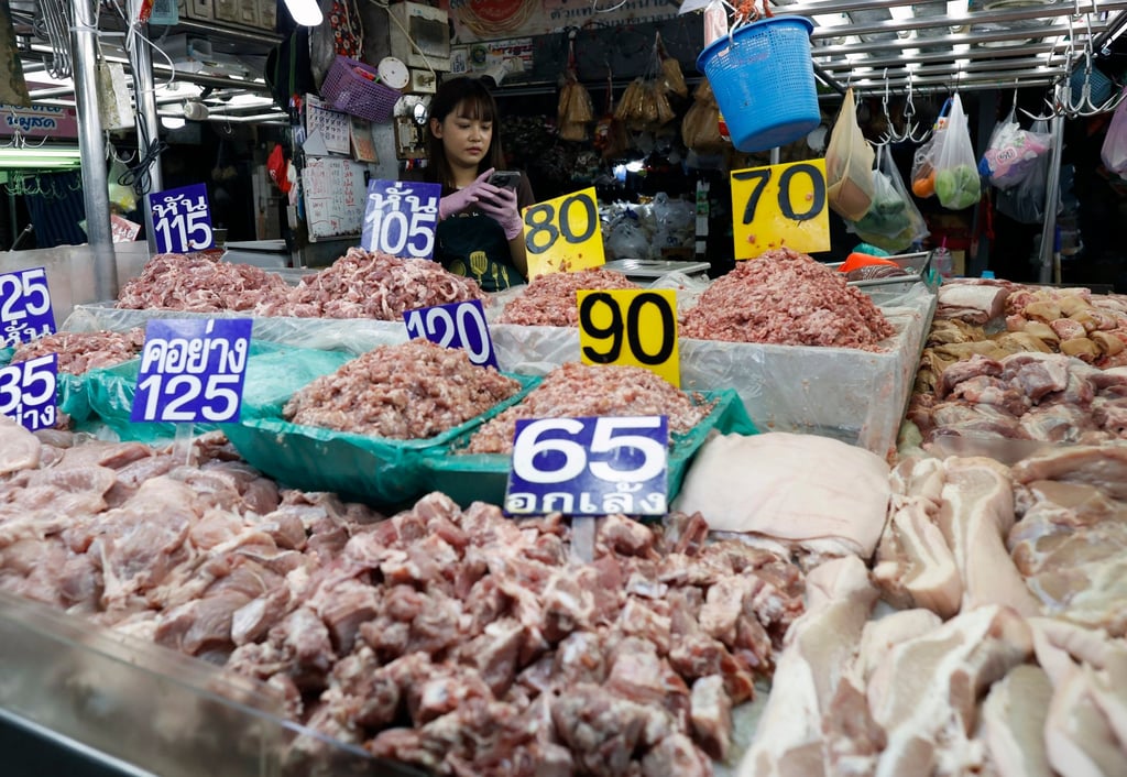 A chicken vendor waits for customers at a fresh market in Bangkok, Thailand, in March. A new UN report has warned a prolonged Iran war could bring about crippling inflation and food insecurity. Photo: EPA