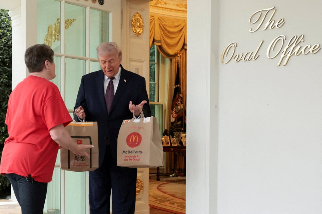 US President Donald Trump receives a McDonald’s delivery on Monday. Photo: Reuters