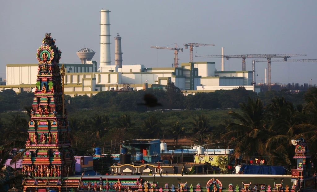 A temple stands in front of the Madras Atomic Power Station at Kalpakkam. Photo: AP