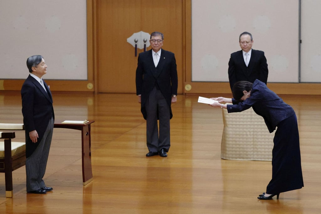 Japan’s Emperor Naruhito stands as new Prime Minister Sanae Takaichi bows while former prime minister Shigeru Ishiba looks on, during Takaichi’s attestation ceremony at the Imperial Palace in Tokyo on October 21. Photo: Reuters Japan’s Emperor Naruhito stands as new Prime Minister Sanae Takaichi bows while former prime minister Shigeru Ishiba looks on, during Takaichi’s attestation ceremony at the Imperial Palace in Tokyo on October 21. Photo: Reuters