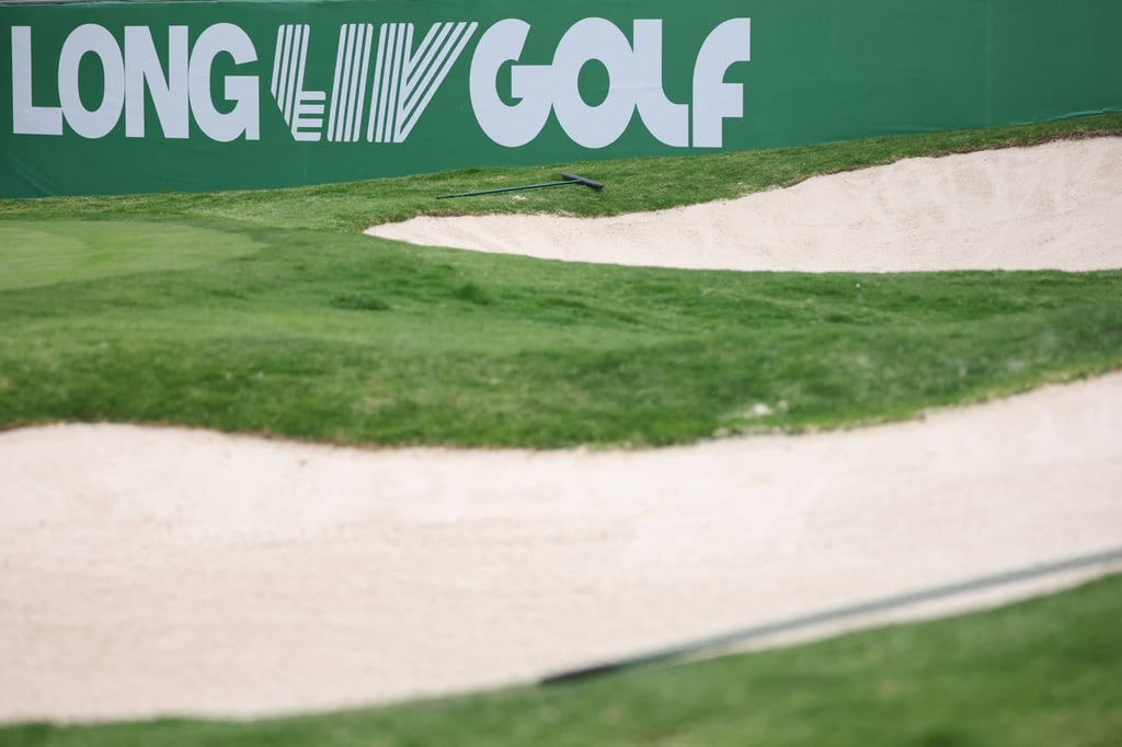 A LIV Golf sign runs alongside the 18th hole at Club de Golf Chapultepec. Photo: Getty Images A LIV Golf sign runs alongside the 18th hole at Club de Golf Chapultepec. Photo: Getty Images