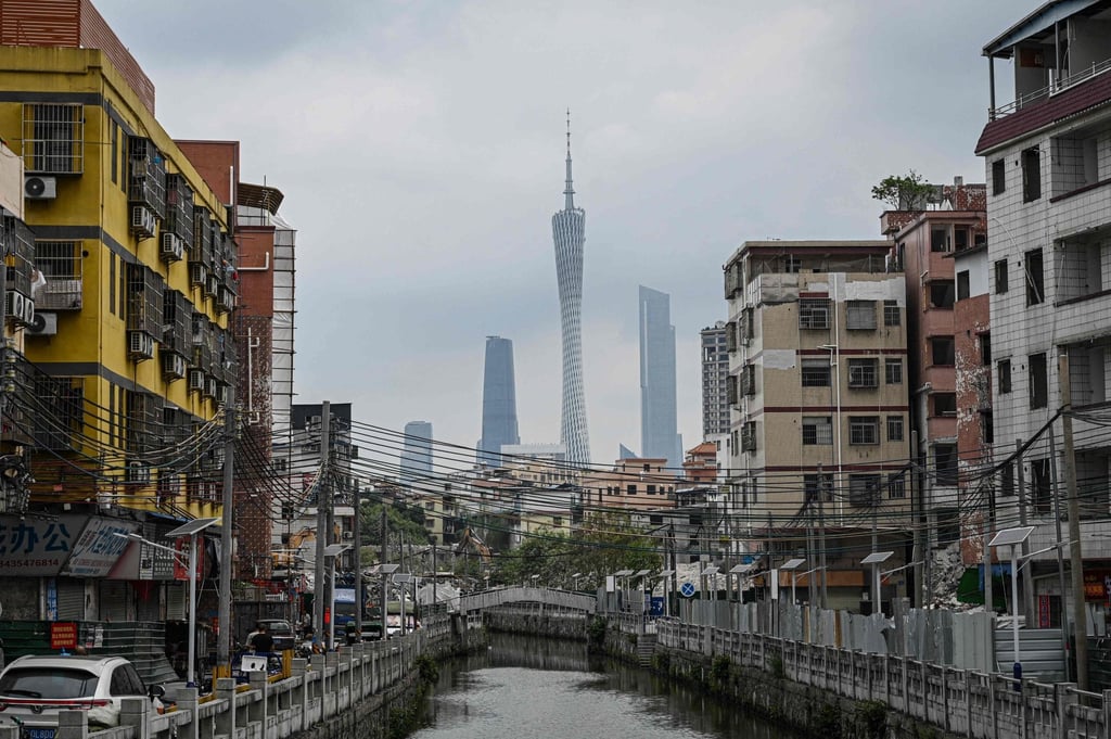 The city skyline and residential buildings along a canal in in Guangzhou on Thursday. China has been prioritising internal stability over global power projection. Photo: AFP
