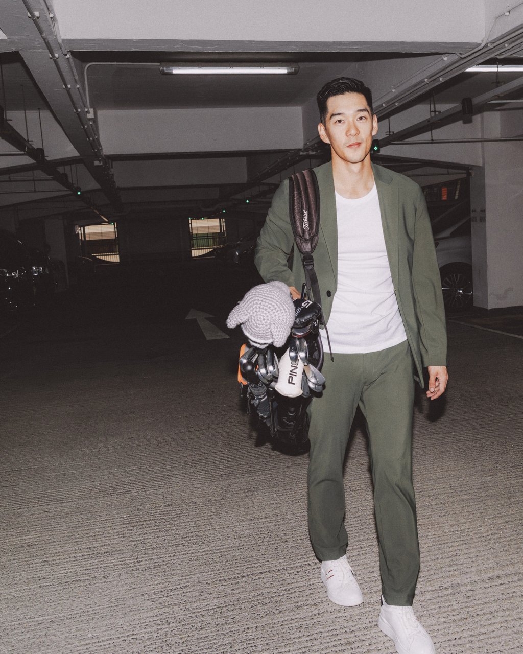 Enzo Chang, who has a “love-hate” relationship with golf, in Rumsey Street Car Park, in Hong Kong’s Sheung Wan district. Photo: Jocelyn Tam