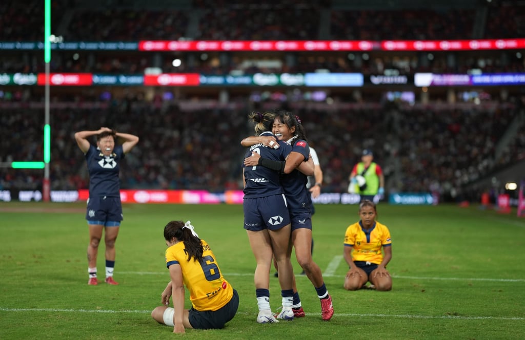 Haruka Uematsu is hugged by Au King-to (right) after scoring on her Sevens debut. Photo: Elson Li