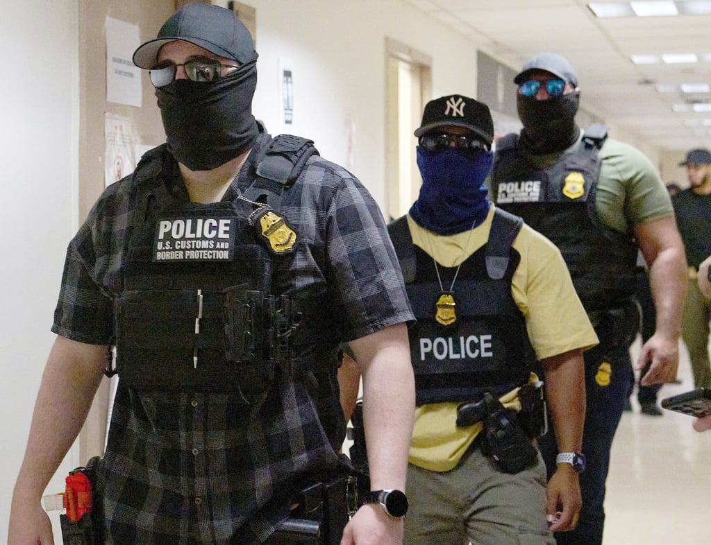ICE agents arrest immigrants and asylum seekers reporting for immigration court proceedings in New York on July 24, 2025. Photo: AFP