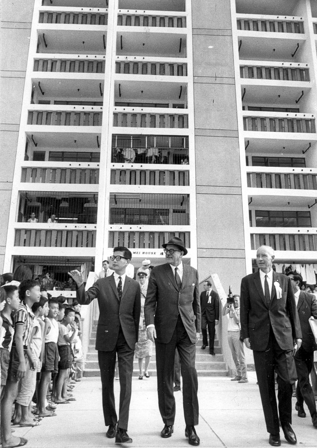 (From left to right) Director of housing Donald Liao Poon-huai, Governor Sir David Trench and B.C. Field, of the Hong Kong Housing Authority, in front of Wah Mei House during the official opening in 1968 of the Wah Fu Estate. Photo: SCMP Archives