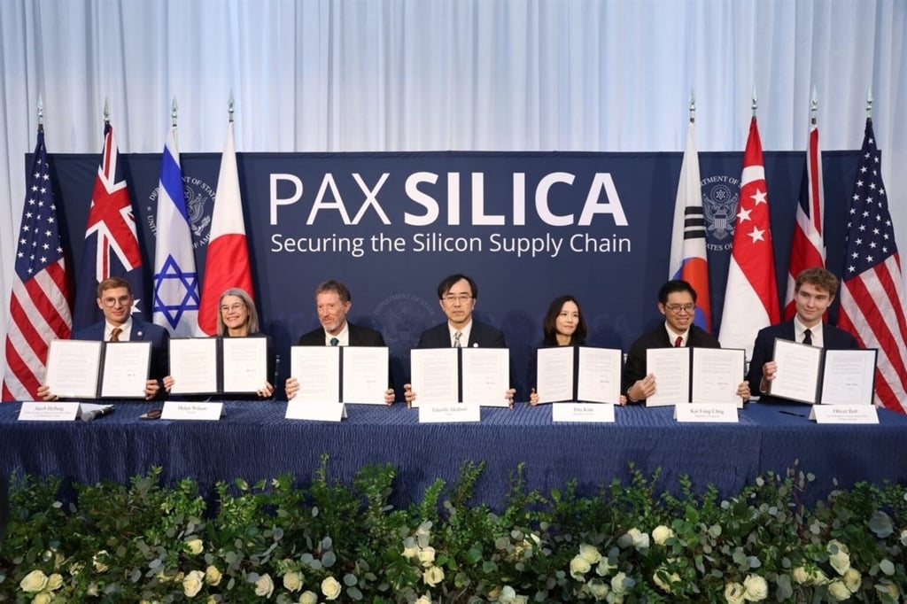Officials hold documents at an event in Washington launching the US-led Pax Silica in December. Photo: Getty Images/AFP