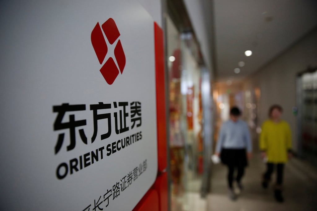 Orient Securities has more than 8,000 employees and a network of 170 outlets across the country. Photo: Reuters