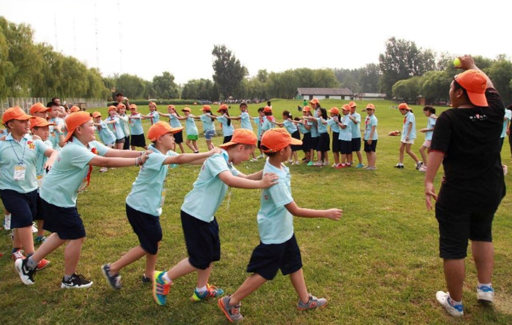 Youngsters take part in group training during a summer camp in Beijing. Photo: Xinhua
