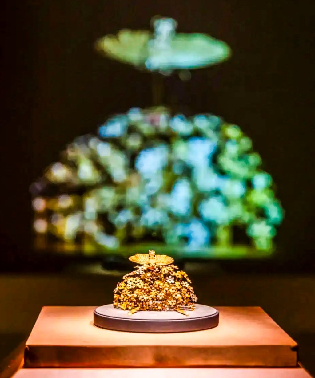 A gold crown, found buried with Li, crafted from wire, sheets, pearls, and gemstones, featured flowers and a moth, symbolising her grandmother’s wish for “many children and lasting prosperity.” Photo: Courtesy of The National Museum of China
