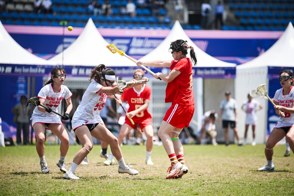 Hong Kong women’s team (white) lost to China in the final. Photo: Hong Kong, China Lacrosse Association