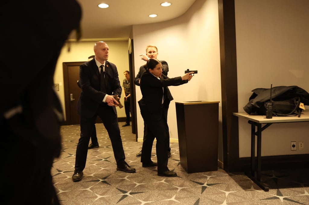 Secret Service agents respond during the White House Correspondents’ Dinner on Saturday. Photo: AP