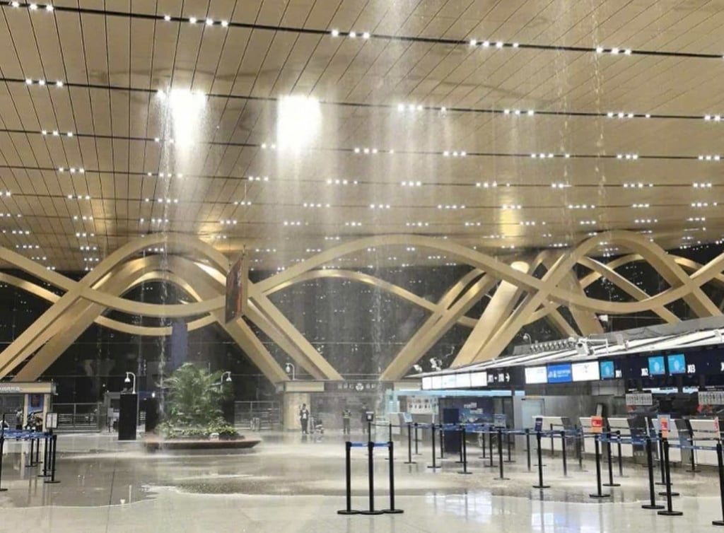 Some stranded passengers at Kunming Changshui Airport on Sunday described water pouring into the facility like “indoor waterfalls”. Photo: Handout