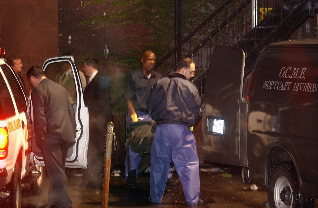 Jason Mizell’s body being removed from the recording studio where he was killed in 2002. Photo: AP