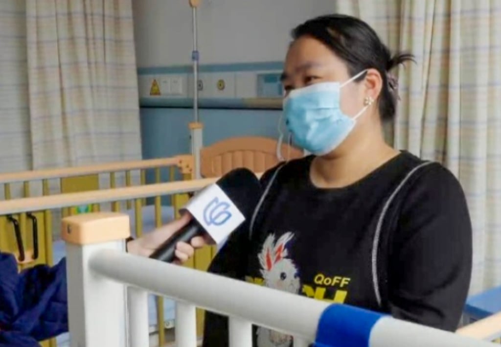 The boy’s mother, above, told the media that her son had lost his appetite because of the lump. Photo: QQ.com