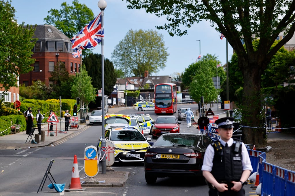 Police officers at the scene of a stabbing in London on Wednesday. Photo: EPA