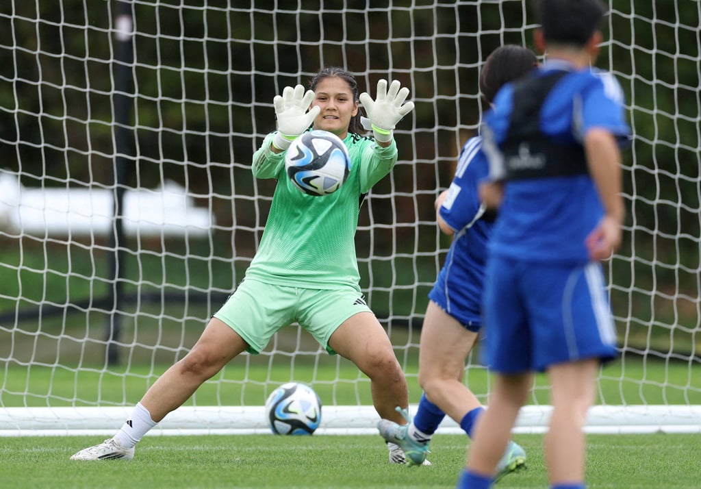 Elaha Safdari makes a save during the Afghan women's selection camp at St George's Park in England. Photo: Reuters