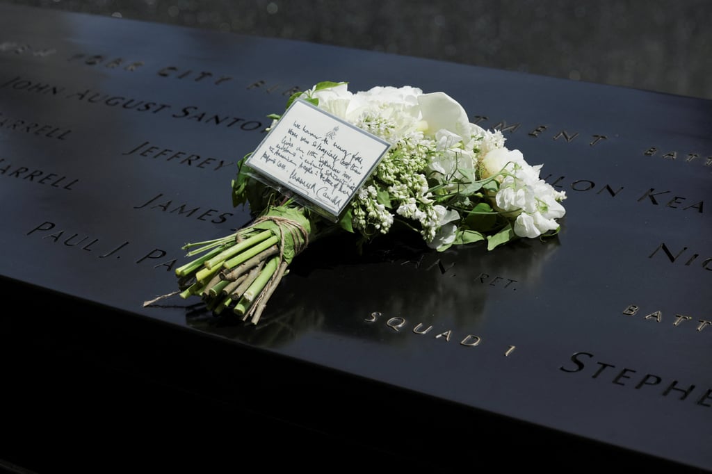 A bouquet of flowers with a note from Britain’s King Charles and Queen Camilla lies at the 9/11 Memorial in New York on Wednesday. Photo: Reuters