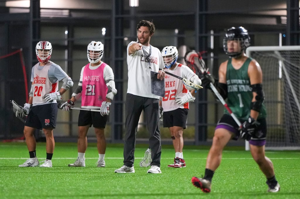 New Hong Kong lacrosse head coach Kevin Crowley puts his players through their paces at Ma Chai Hang Recreation Ground, in Wong Tai Sin. Photo: Sam Tsang