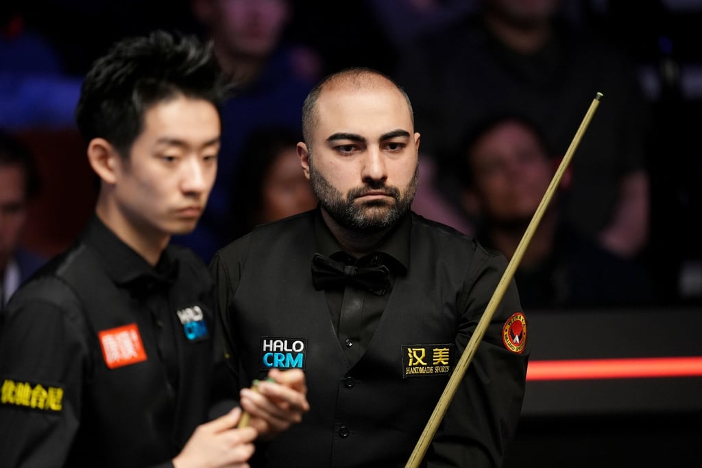 Wu Yize (left) beat Hossein Vafaei to become only the fourth Chinese player to reach the semis. Photo: AP Wu Yize (left) beat Hossein Vafaei to become only the fourth Chinese player to reach the semis. Photo: AP