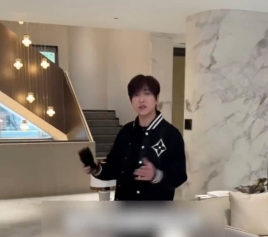 Popular online food influencer Bai Bing pictured at his home, above. Photo: CCTV